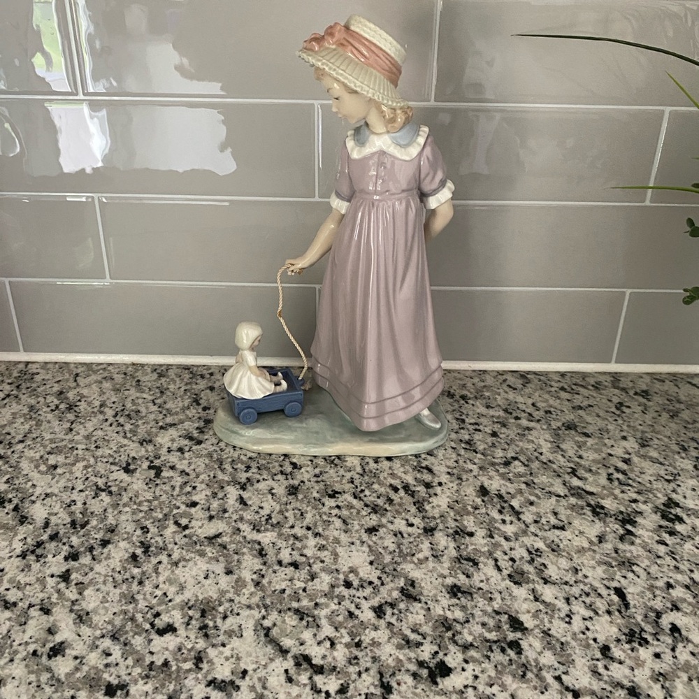 Lladro Girl in Lavender Dress with Blue Wagon Figurine. Great condition